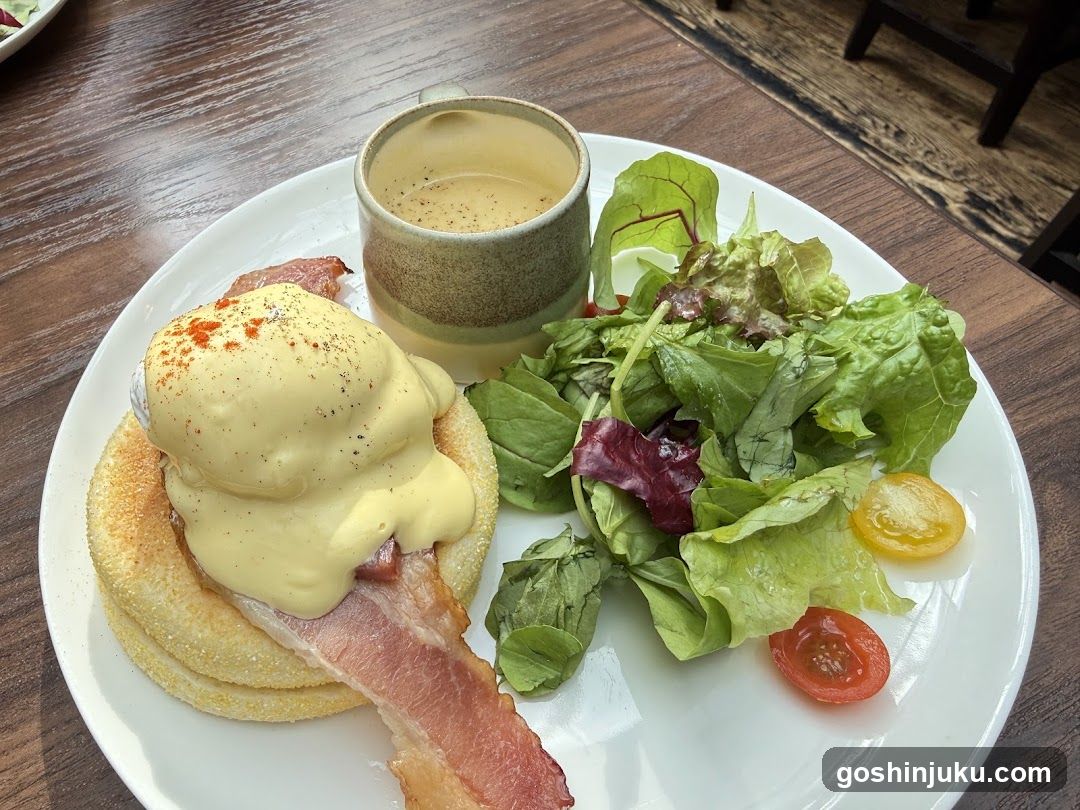 Eggs Benedict with Salad and Coffee
