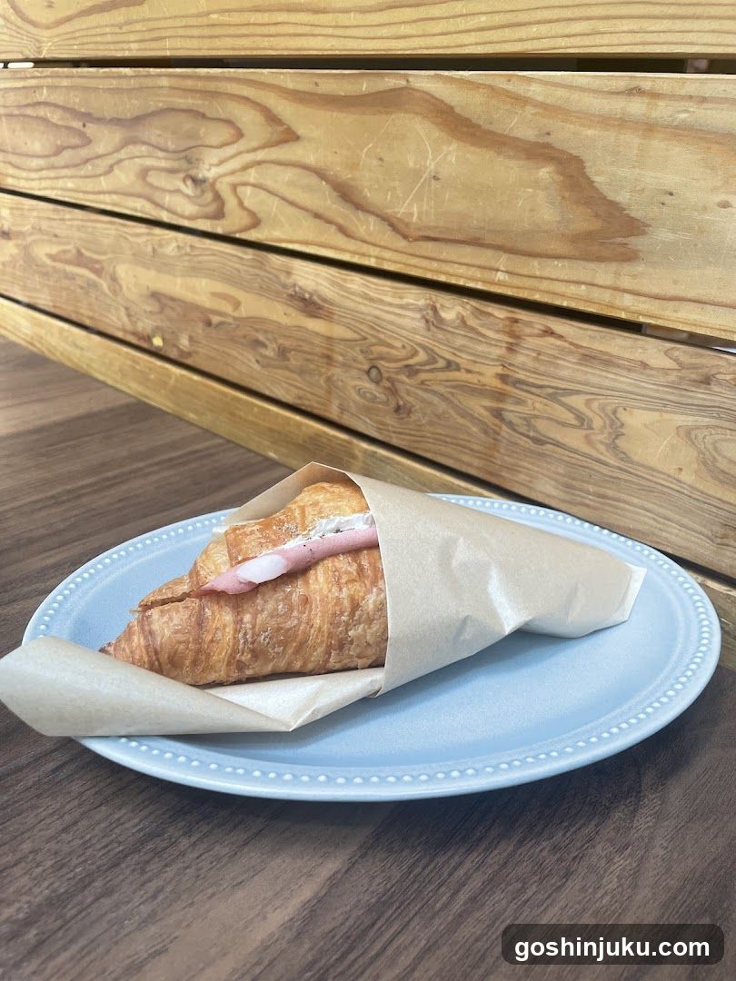 Croissant Sandwich on Blue Plate