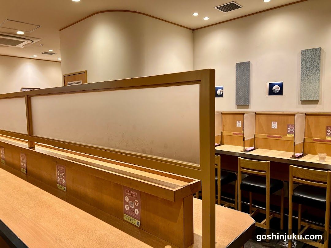 Restaurant Interior with Wooden Booths and Privacy Screens