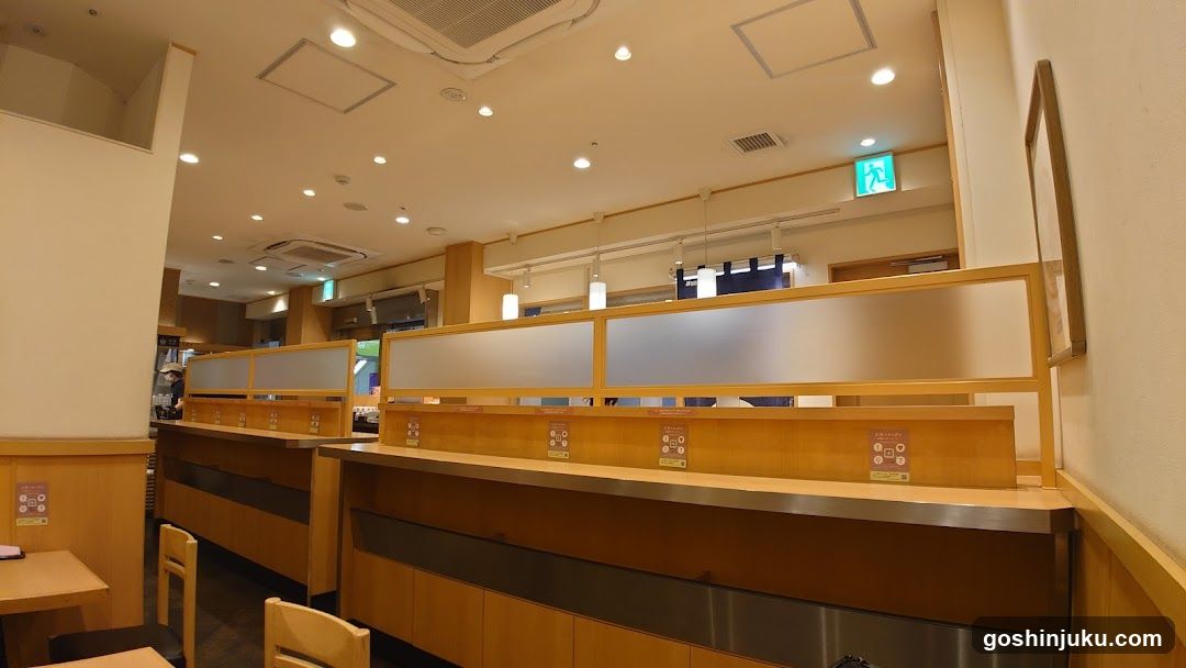 Restaurant Interior with Wooden Seating and Barriers