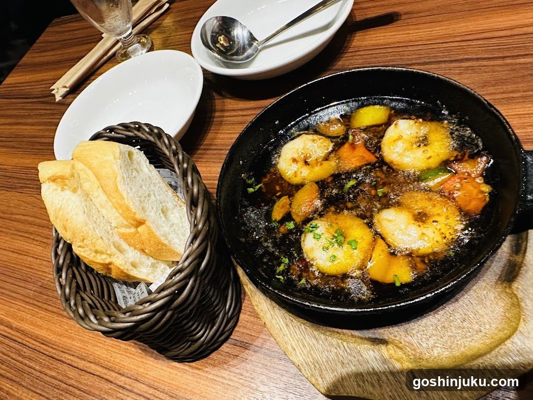 Sizzling Shrimp Dish with Bread