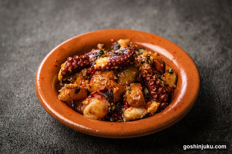 Spicy Octopus Dish in Terrotta Bowl