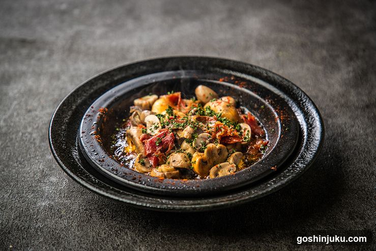Mushroom and Meat Stew in Black Bowl