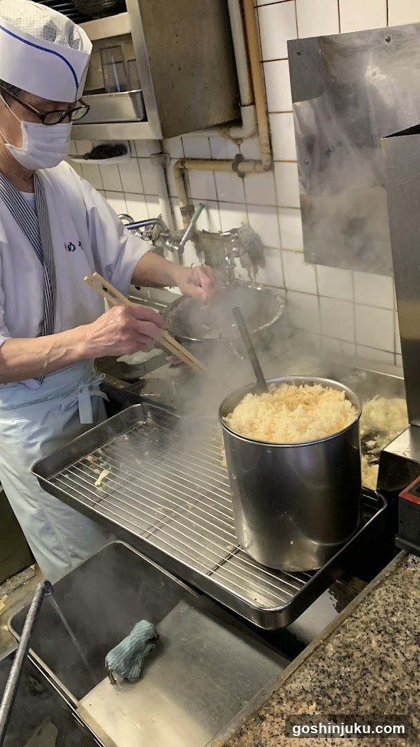 Chef Cooking Rice in Kitchen