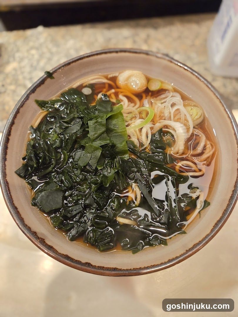 Bowl of Noodle Soup with Greens