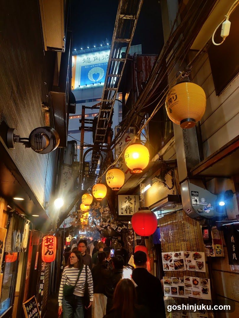 Night Street Scene with Lanterns and Crowds