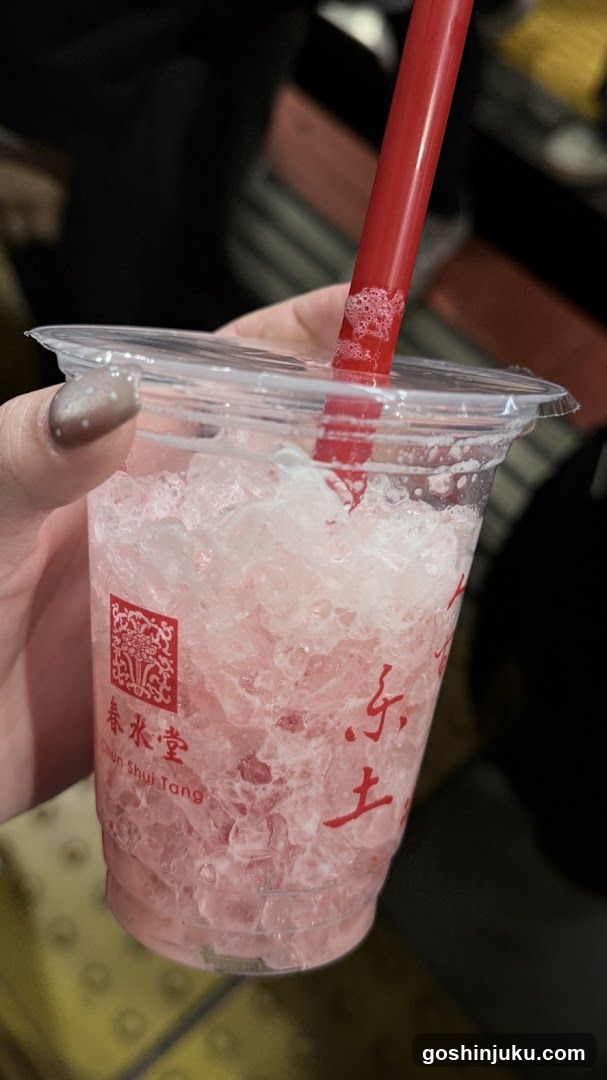 Pink Iced Drink with Red Straw