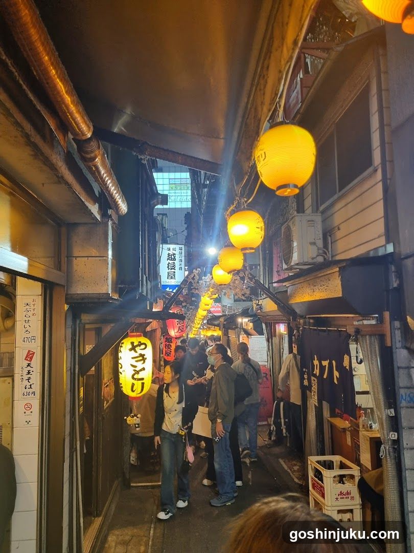 Night Street Scene with Lanterns and Crowds