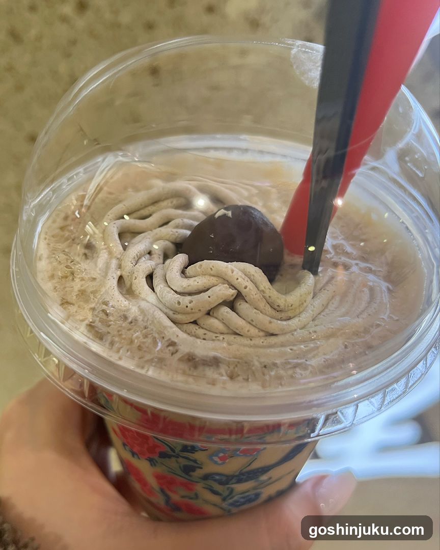 Iced Coffee with Whipped Cream and Chocolate Ball