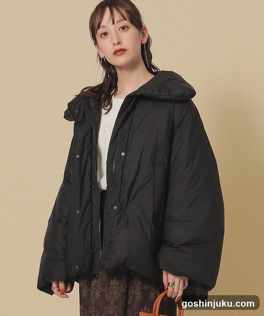 Fashion Model in Black Puffer Jacket