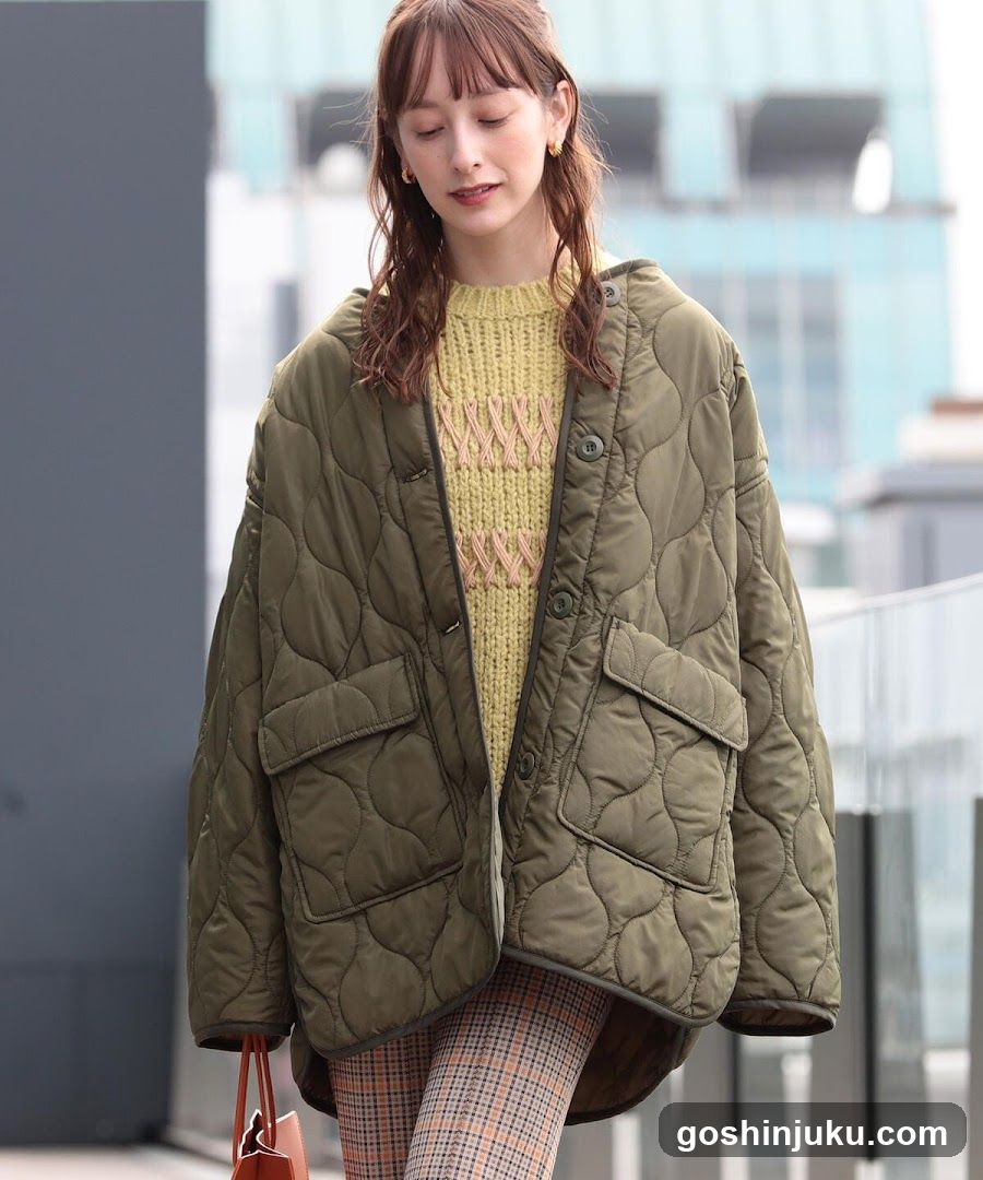Woman in Olive Quilted Jacket