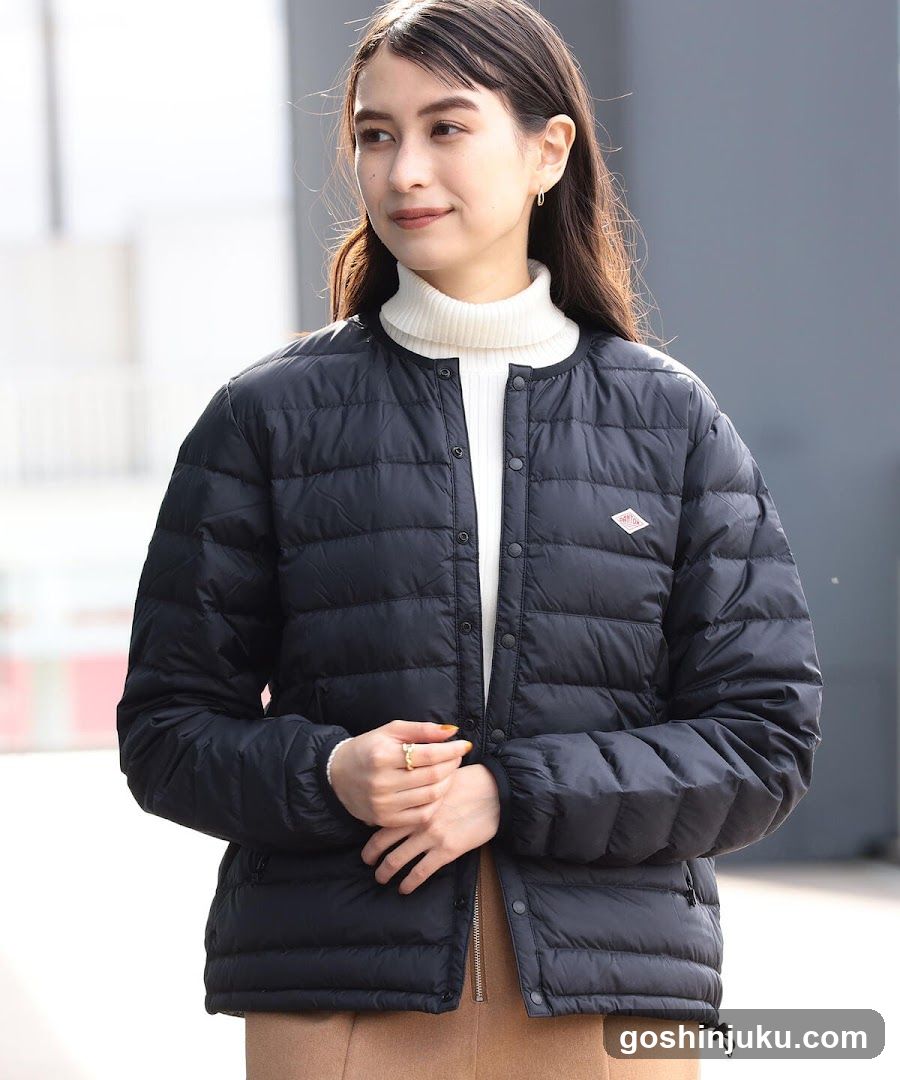 Model wearing a navy puffer jacket