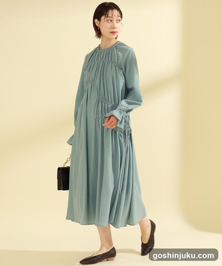 Woman in Teal Dress