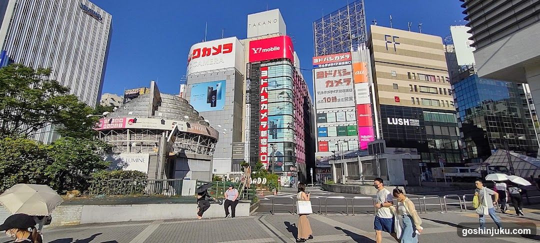 Tokyo Street Scene with Storefronts and Billboards