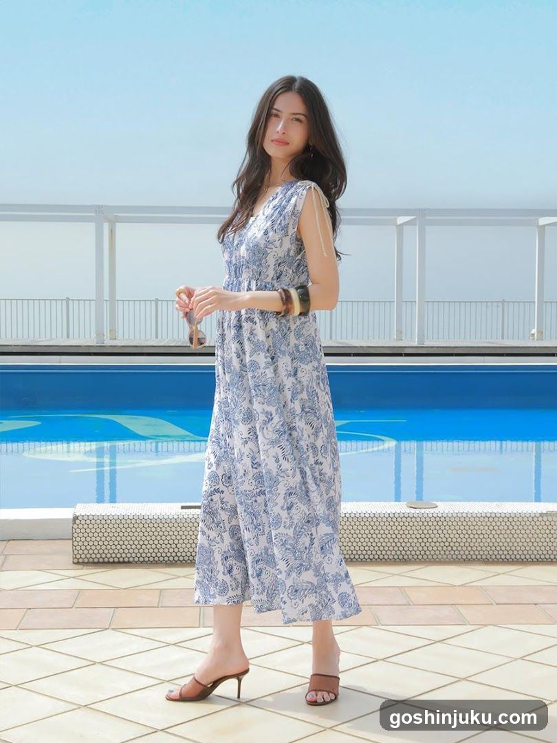 Woman in Floral Dress by Poolside