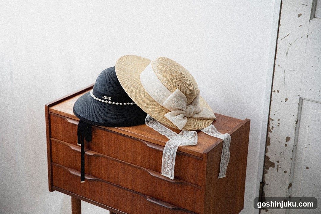 Hats on a wooden dresser
