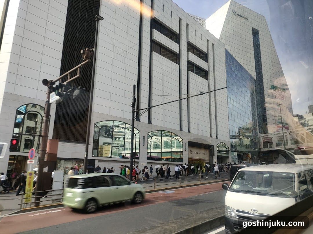 Urban Street Scene with Pedestrians and Vehicles