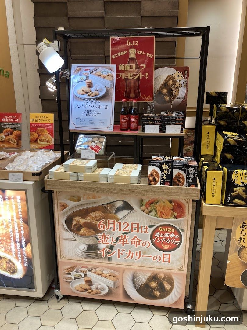 Food Display Stand with Posters and Products